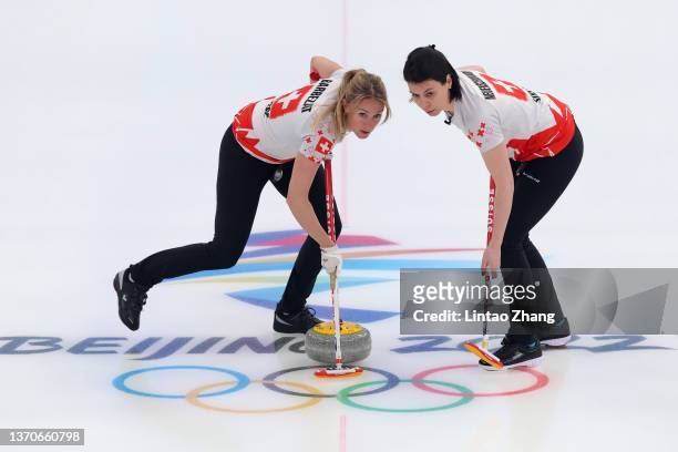 Melanie Barbezat and Esther Neuenschwander of Team Switzerland compete against Team United States during the Women’s Curling Round Robin Session on...