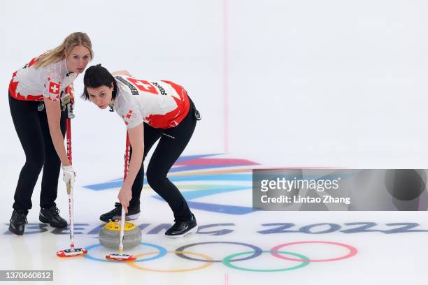 Melanie Barbezat and Esther Neuenschwander of Team Switzerland compete against Team United States during the Women’s Curling Round Robin Session on...
