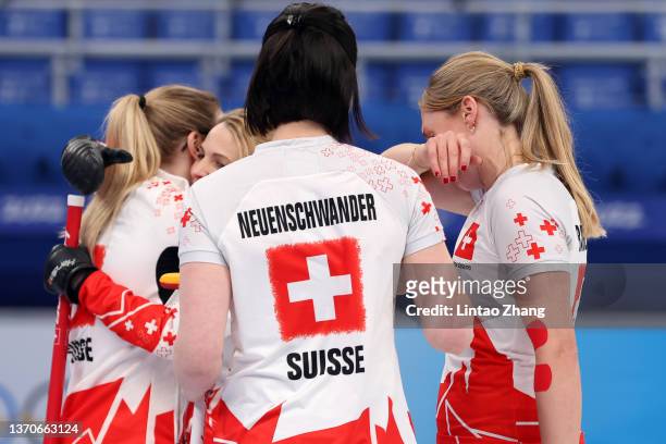 Melanie Barbezat, Esther Neuenschwander, Silvana Tirinzoni and Alina Paetz of Team Switzerland celebrate their victory against Team United States...