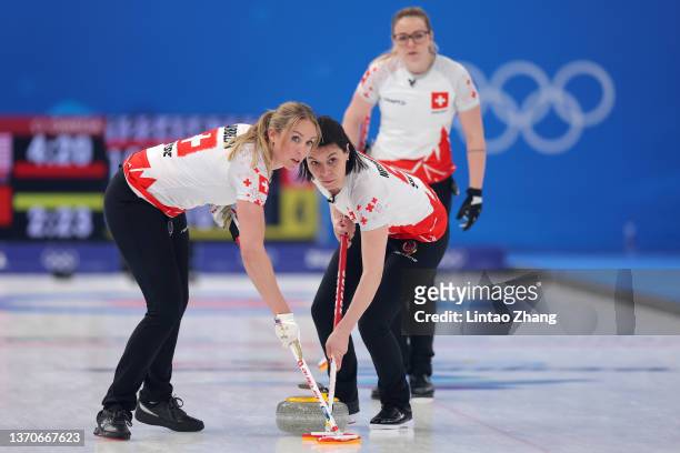 Melanie Barbezat, Esther Neuenschwander and Alina Paetz of Team Switzerland compete against Team United States during the Women’s Curling Round Robin...