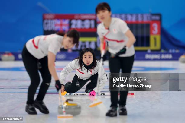 Yurika Yoshida, Satsuki Fujisawa and Yumi Suzuki of Team Japan compete against Team Great Britain during the Women’s Curling Round Robin Session on...