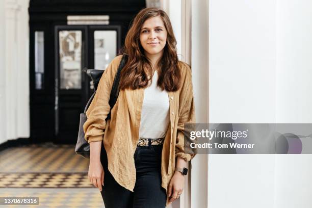 portrait of college student on her way to seminar - study hall stock pictures, royalty-free photos & images