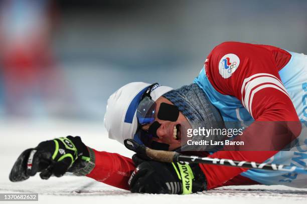 Viacheslav Barkov of Team ROC reacts following the Individual Gundersen Large Hill/10km, Cross Country Competition Round on day 11 of 2022 Beijing...