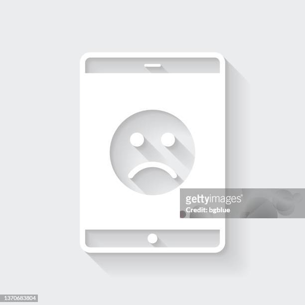 ilustrações, clipart, desenhos animados e ícones de tablet pc com emoji triste. ícone com sombra longa em fundo em branco - design plano - disappointing phone