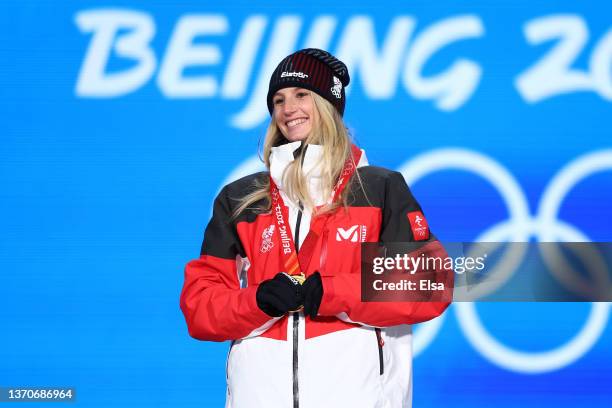 Gold medallist Anna Gasser of Team Austria poses with their medal during the Women's Snowboard Big Air medal ceremony on Day 11 of the Beijing 2022...