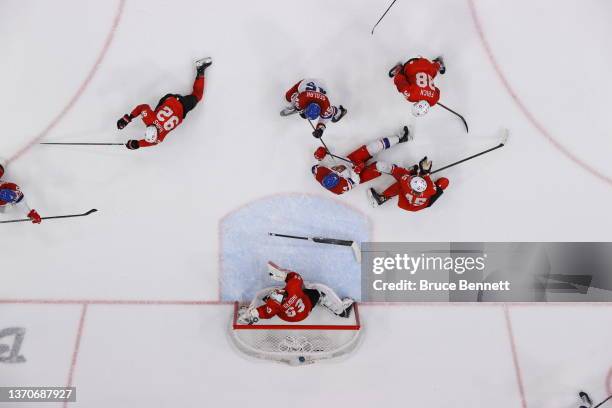 Team Czech Republic scores their 2 goal over Leonardo Genoni, goaltender of Team Switzerland in the third period during the Men’s Ice Hockey...