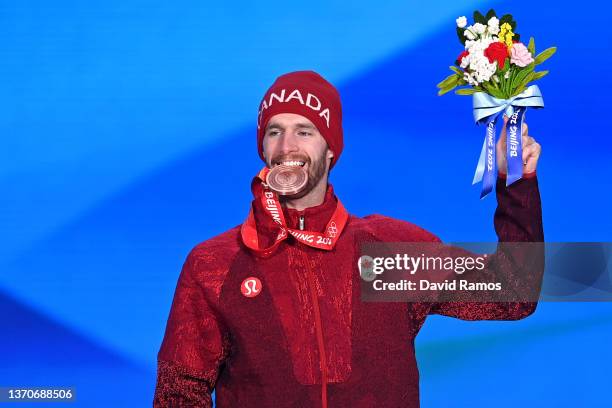 Bronze medallist Max Parrot of Team Canada poses with their medal during the Men’s Snowboard Big Air medal ceremony on Day 11 of the Beijing 2022...