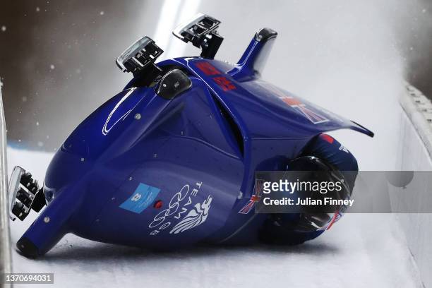 Brad Hall and Nick Gleeson of Team Great Britain crash during the 2-man Bobsleigh Heat 3 on day 11 of Beijing 2022 Winter Olympic Games at National...