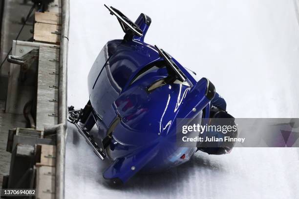 Brad Hall and Nick Gleeson of Team Great Britain crash during the 2-man Bobsleigh Heat 3 on day 11 of Beijing 2022 Winter Olympic Games at National...