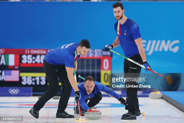 Sebastiano Arman, Joel Retornaz and Amos Mosaner of Team Italy compete against Team United States during the Men’s Curling Round Robin Session on Day...