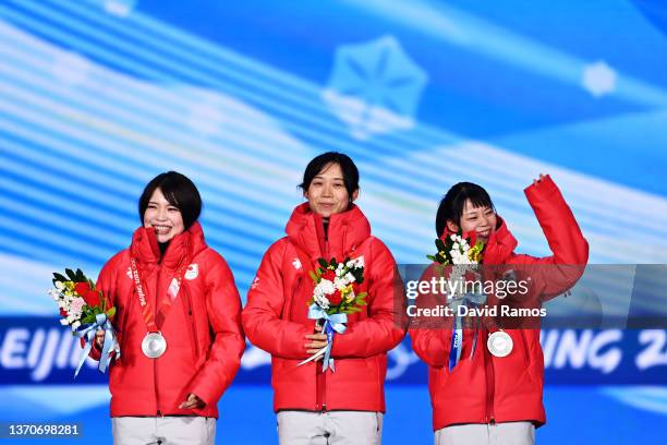 Silver Medallists Ayano Sato, Miho Takagi and Nana Takagi of Team Japan celebrate with their medals during the Women's Team Pursuit medal ceremony on...