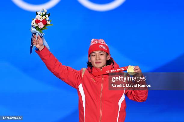 Gold Medallist Yiming Su of Team China celebrates with their medal during the Men’s Snowboard Big Air medal ceremony on Day 11 of the Beijing 2022...