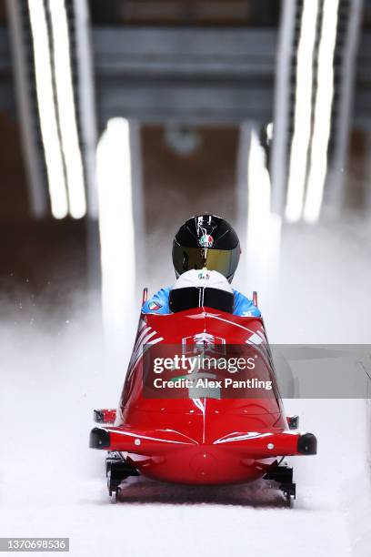 Patrick Baumgartner and Robert Mircea of Team Italy slide during the 2-man Bobsleigh Heat 3 on day 11 of Beijing 2022 Winter Olympic Games at...