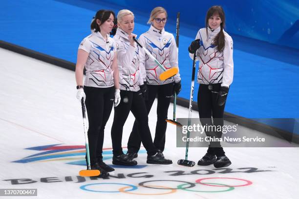 Ekaterina Kuzmina, Julia Portunova, Galina Arsenkina and Alina Kovaleva of Team ROC react during the Women's Curling Round Robin Session between Team...