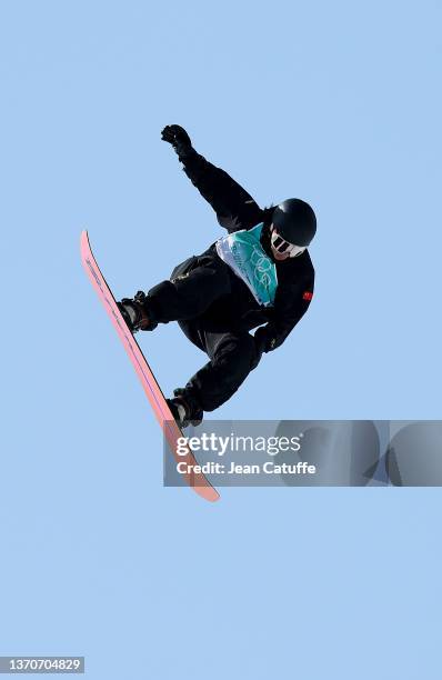 Yiming Su of Team China performs a trick during the Men's Snowboard Big Air final on Day 11 of the Beijing Winter Olympics at Big Air Shougang on...