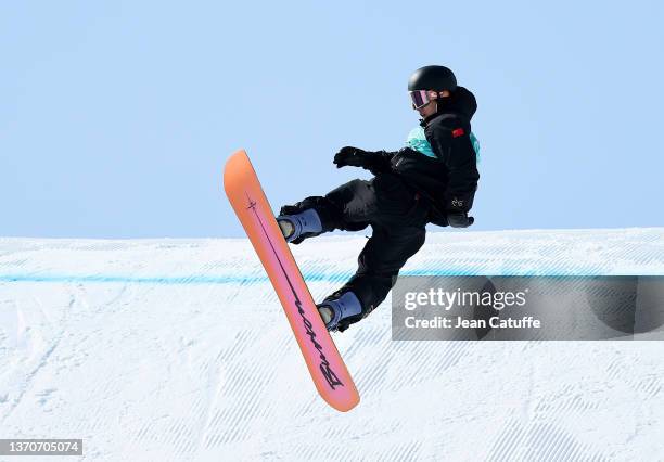 Yiming Su of Team China performs a trick during the Men's Snowboard Big Air final on Day 11 of the Beijing Winter Olympics at Big Air Shougang on...