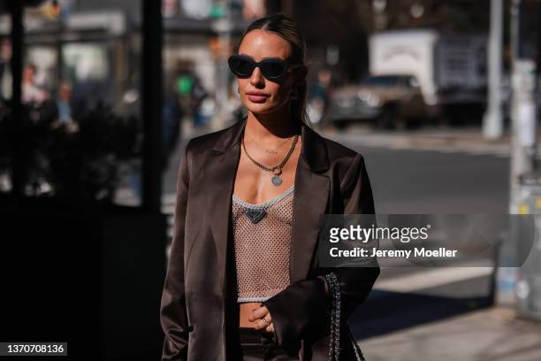 Fashion Week Guest is seen outside Bronx and Banco during New York Fashion Week on February 11, 2022 in New York City.