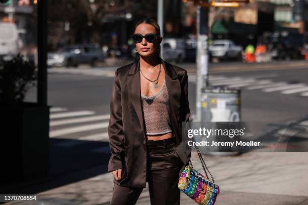 Fashion Week Guest is seen outside Bronx and Banco during New York Fashion Week on February 11, 2022 in New York City.