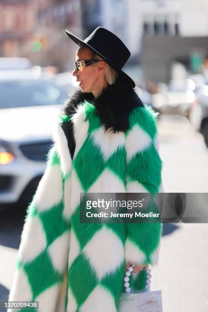 Denisa Palsha is seen outside Bronx and Banco during New York Fashion Week on February 11, 2022 in New York City.