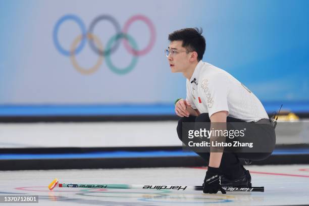 Jingtao Xu of Team China competes against Team Norway during the Men’s Curling Round Robin Session on Day 11 of the Beijing 2022 Winter Olympic Games...