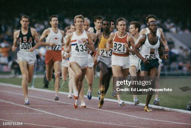 Kipchoge Keino of Kenya leads Oleg Rayko of the Soviet Union , Ahmed Issa of Chad , John Whetton of Great Britain and Jim Ryun of the United States...