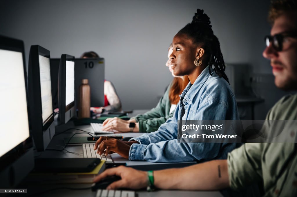 Students Working On Computer Assignment During Seminar Group High-Res ...