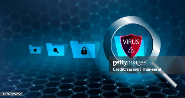 the magnifying glass is scanning for viruses in sensitive data. - software antivirus fotografías e imágenes de stock