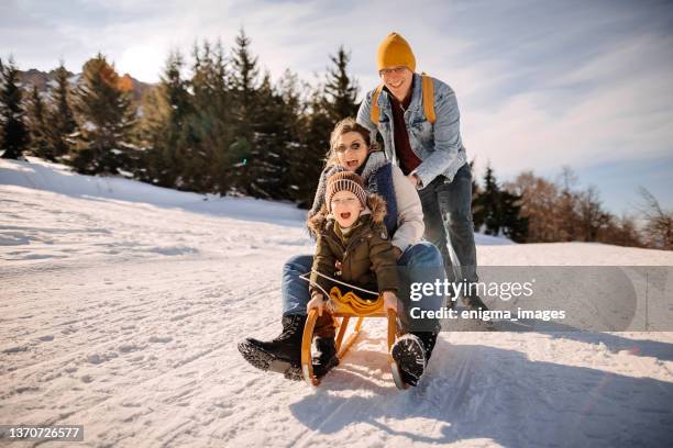 winters magics - kids playing in snow imagens e fotografias de stock