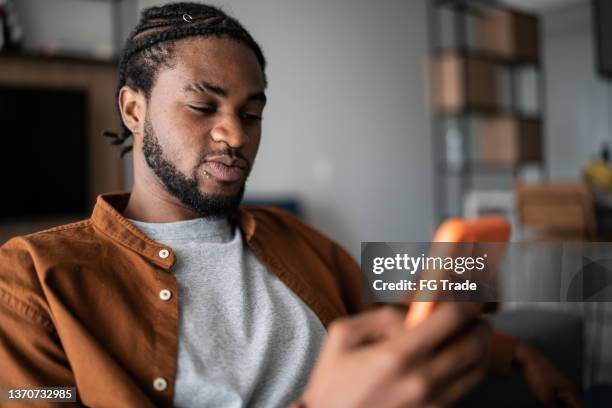 Man Using Mobile App 1,269 Man Downloading App Stock Photos, High-Res Pictures, and Images ...