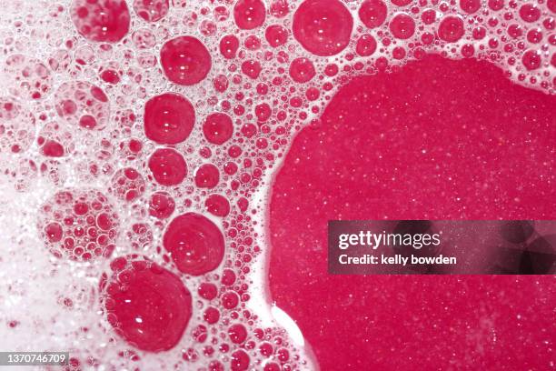 pink bubble bath water glitter bath bomb - glitter bomb stock pictures, royalty-free photos & images
