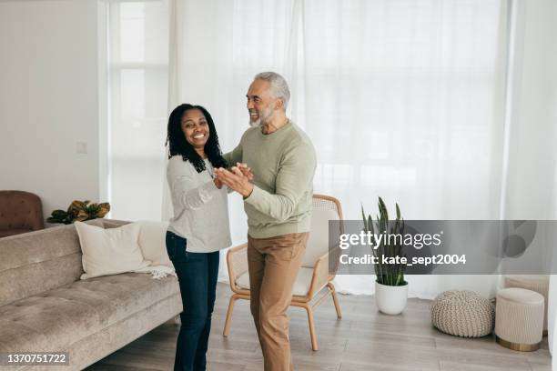 earning income while retired - older couple ballroom dancing stock pictures, royalty-free photos & images