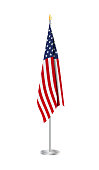 Flag of the United States of America on steel flagpole. Usa Flag isolated on white background.