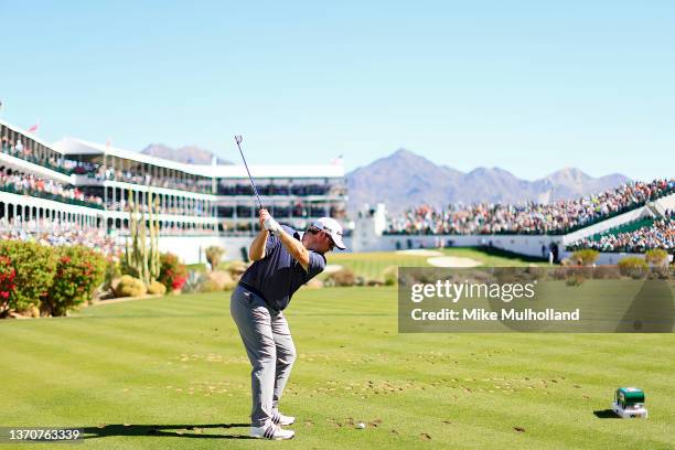 Harry Higgs of the United States looks on while waiting to putt on the 16th hole during the final round of the WM Phoenix Open at TPC Scottsdale on...