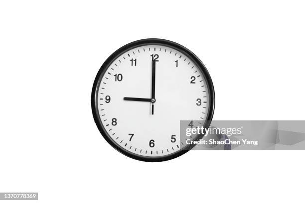 clock - 9 o'clock - clock on wall stock pictures, royalty-free photos & images