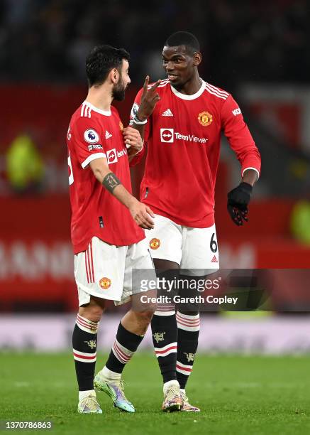 Bruno Fernandes celebrates with Paul Pogba of Manchester United after scoring their team's second goal during the Premier League match between...