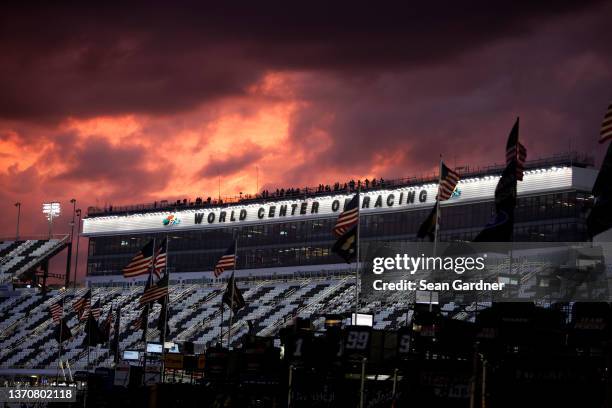 General view of the grandstands as the sun sets during practice for the NASCAR Cup Series 64th Annual Daytona 500 at Daytona International Speedway...