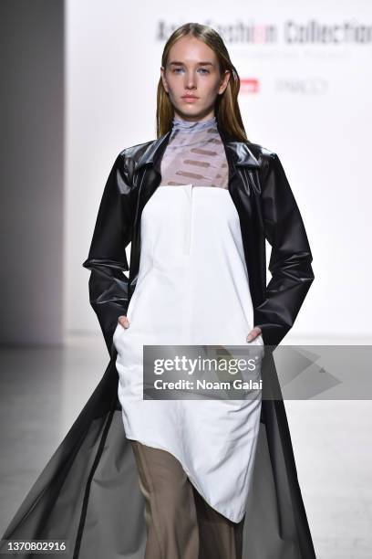 Model walks the runway wearing Glenda Garcia for Asia Fashion Collection during New York Fashion Week: The Shows at Spring Studios on February 15,...