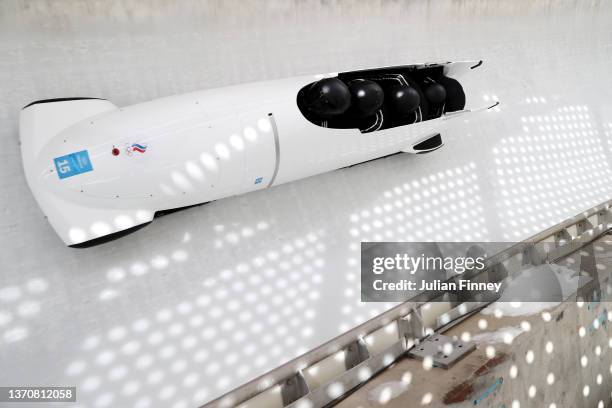 Maxim Andrianov, Dmitrii Lopin, Vladislav Zharovtsev and Aleksey Zaytsev of Team ROC slide during the 4-man Bobsleigh training heats on day 12 of...