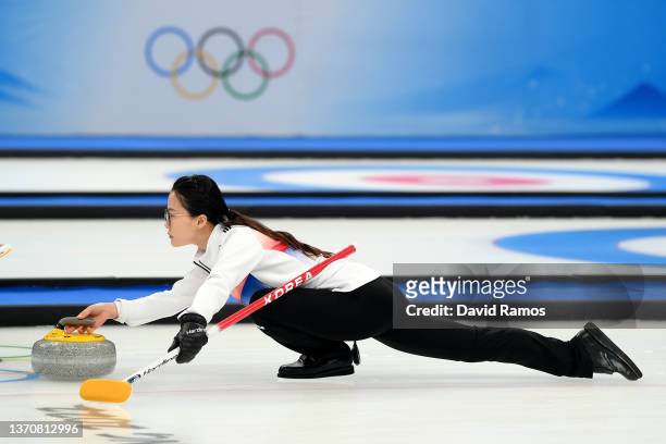 SeonYeong Kim of Team Korea competes against Team Canada during the Women's Round Robin Session on Day 12 of the Beijing 2022 Winter Olympic Games at...