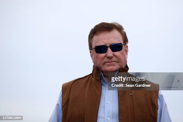 Team owner, Richard Childress walks through the garage area during practice for the NASCAR Cup Series 64th Annual Daytona 500 at Daytona...