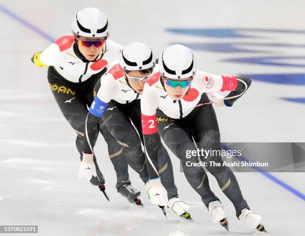 Miho Takagi, Nana Takagi and Ayano Sato of Team Japan compete in the Women's Team Pursuit final against Team Canada on day eleven of the Beijing 2022...