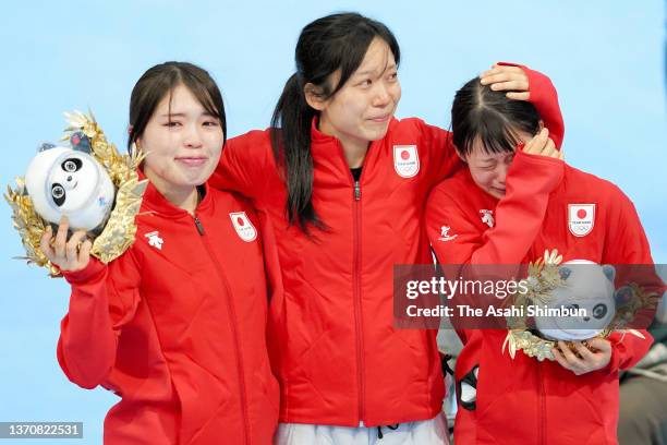 Silver medalists Ayano Sato, Miho Takagi and Nana Takagi of Team Japan stand on the podium at the medal ceremony for the Women's Team Pursuit on day...