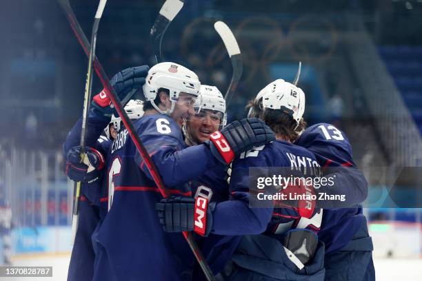 Sam Hentges of Team United States celebrates his second period goal with teammates during the Men’s Ice Hockey Quarterfinal match between Team United...