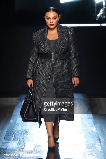 Paloma Elsesser walks the runway during Michael Kors Collection Fall/Winter 2022 Runway Show at Terminal 5 on February 15, 2022 in New York City.