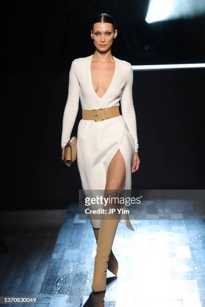 Bella Hadid walks the runway during Michael Kors Collection Fall/Winter 2022 Runway Show at Terminal 5 on February 15, 2022 in New York City.