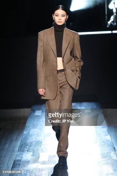 Model walks the runway during Michael Kors Collection Fall/Winter 2022 Runway Show at Terminal 5 on February 15, 2022 in New York City.