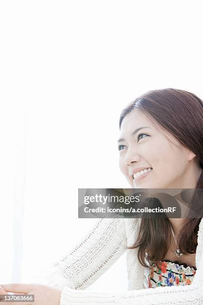 young woman smiling, tokyo prefecture, honshu, japan - 二つに結んだ髪 ストックフォトと画像