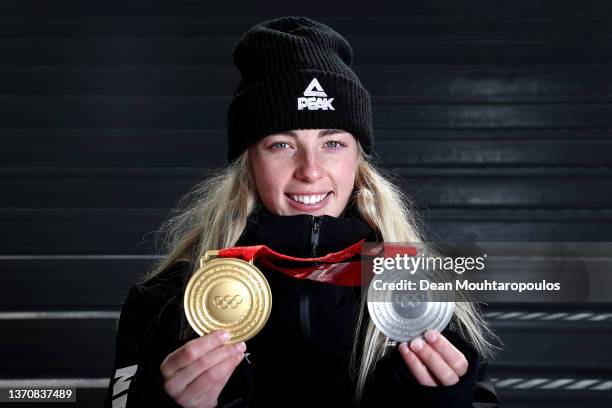 Zoi Sadowski Synnott of Team New Zealand poses with her gold medal in the Women's Snowboard Slopestyle and Silver medal for the Snowboard Big Air on...
