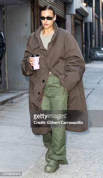Model Irina Shayk is seen arriving to the Michael Kors Collection Fall/Winter 2022 Fashion Show at Terminal 5 during New York Fashion Week on...