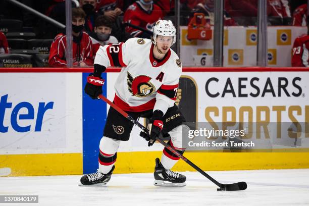 Thomas Chabot of the Ottawa Senators handles the puck against the Washington Capitals during the first period of the game at Capital One Arena on...